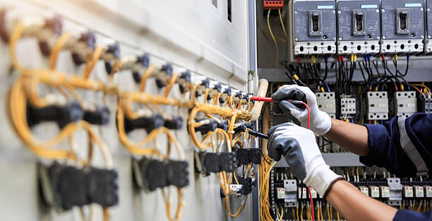 Professional Electrician technician working in North Bellport, NY